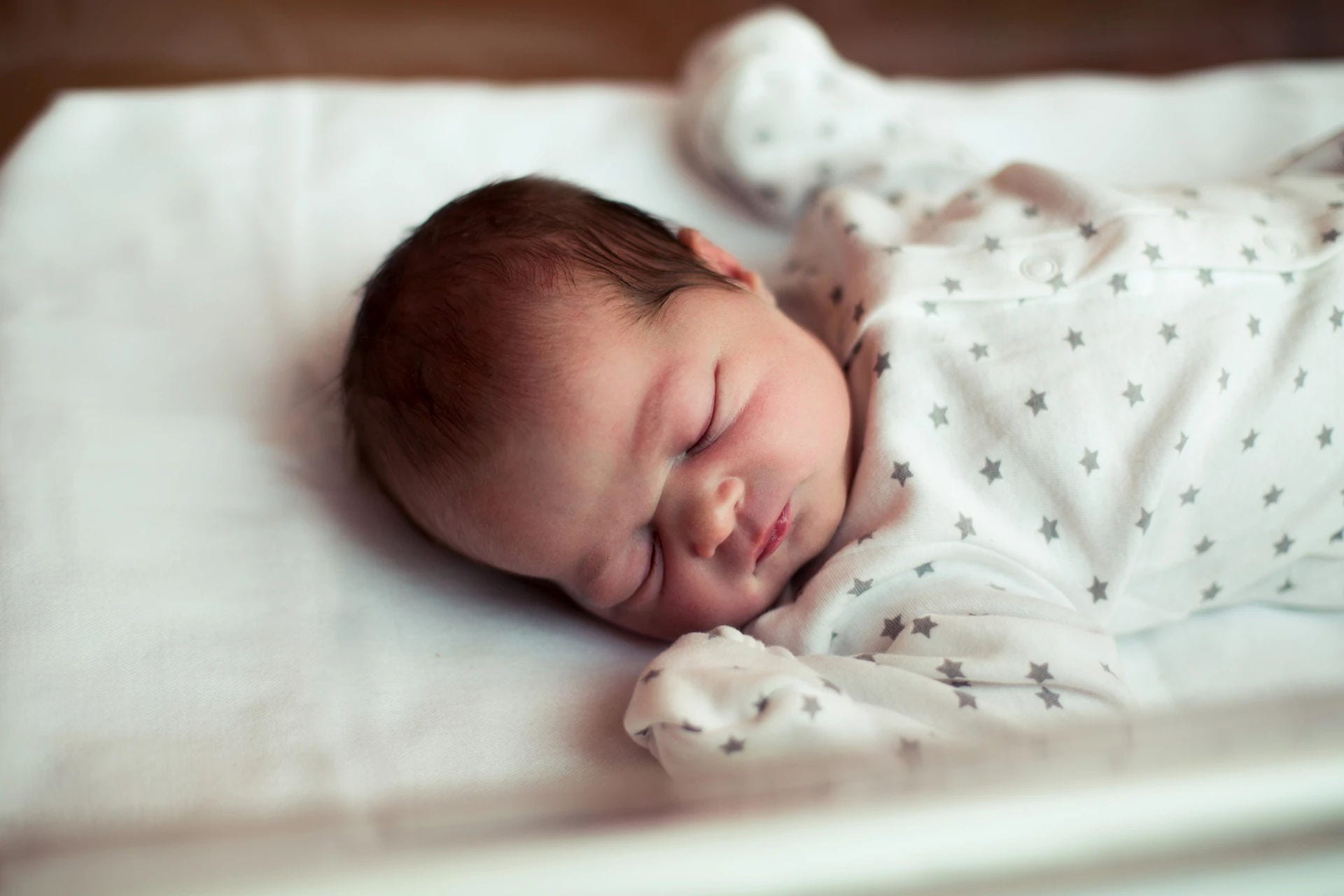 Sleeping newborn girl