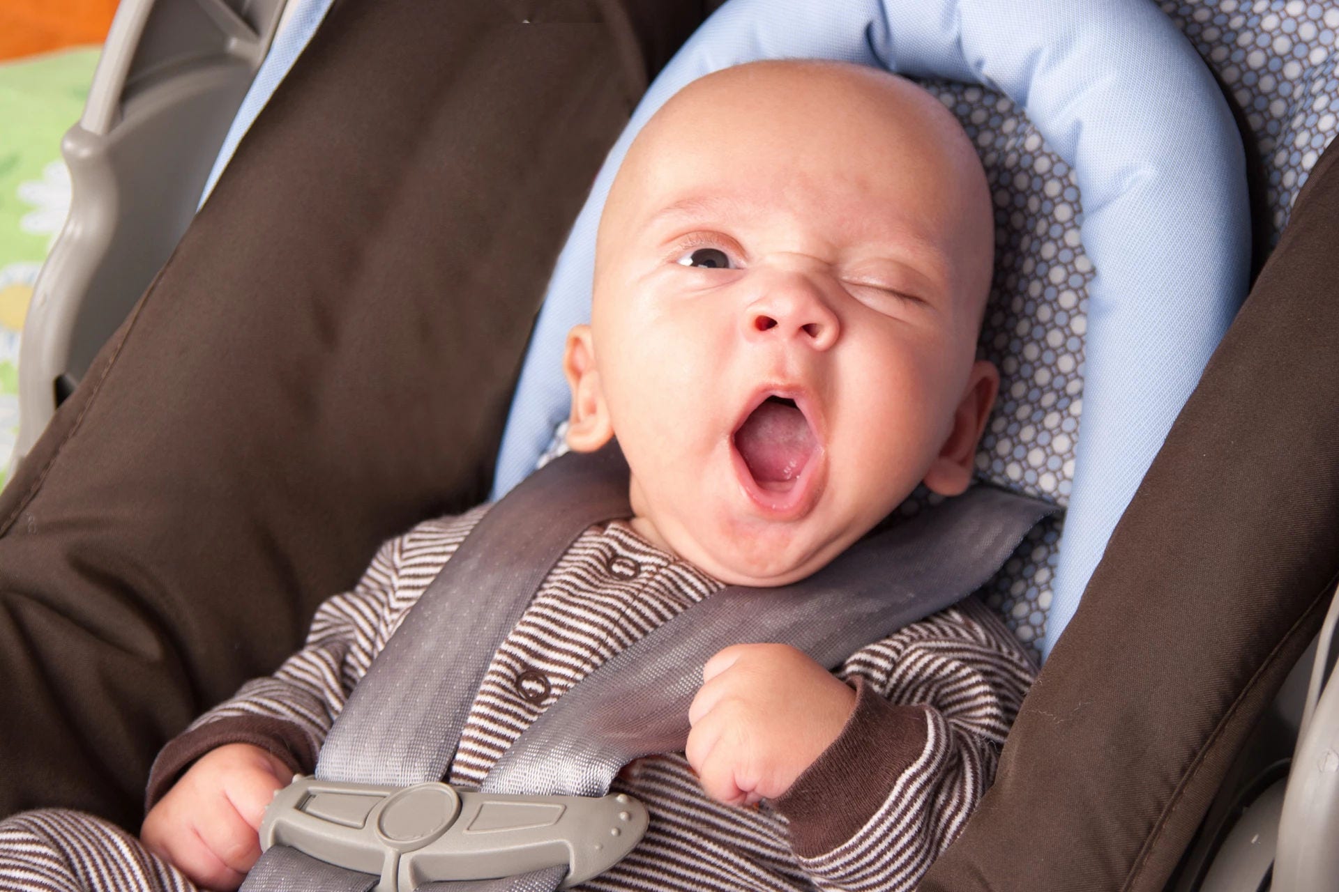 Baby yawning carseat